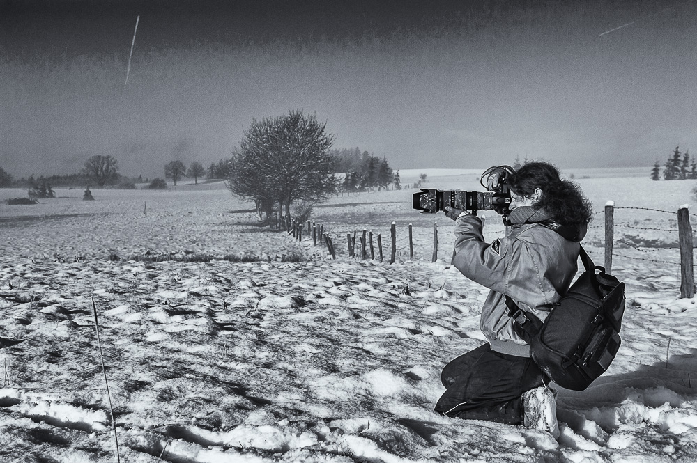woman photographer snow winter