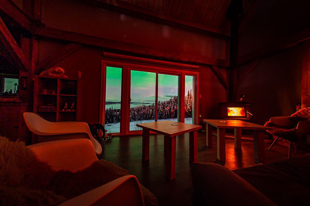 living room cabin aurora panorama window