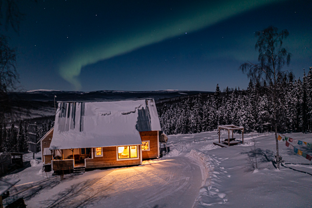 house aurora drone aerial winter snow