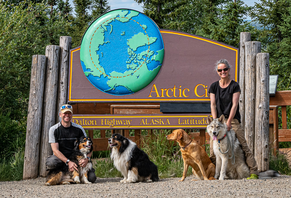 arctic circle couple dogs Alaska