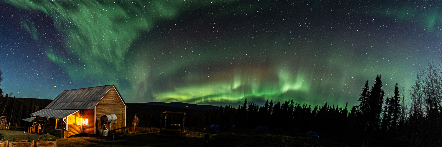 fall Aurora Borealis log cabin